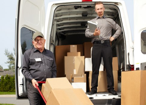 Removal van loading furniture for a home move in Hounslow