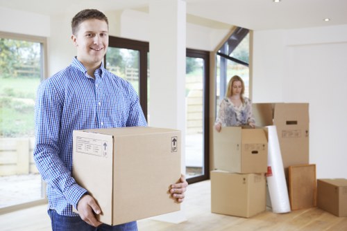 Local moving team handling boxes and fragile items in Hounslow