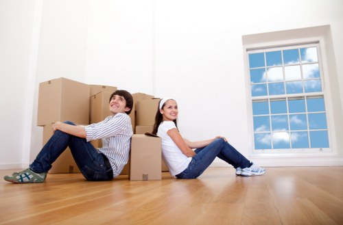 Unpacking service helping a family settle into a new Hounslow property