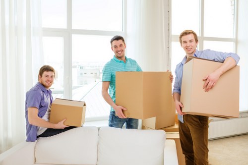Office desks and chairs being moved during a commercial relocation